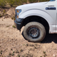 Illustration for article titled That tire is used up, or, another day of pro-level social distancing at work.
